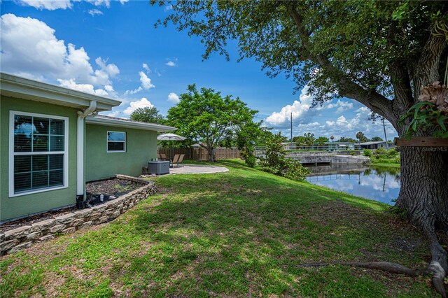 21539 Gladis Ave, Port Charlotte, FL 33952 - view of yard featuring a patio and a water view