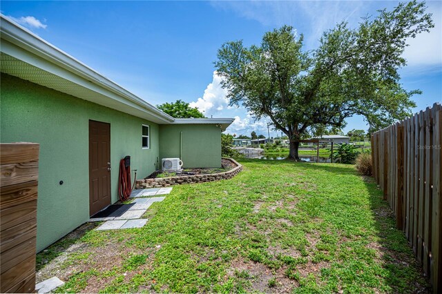 21539 Gladis Ave, Port Charlotte, FL 33952 - fenced backyard with a water view