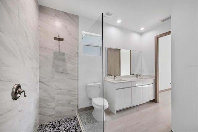 2340 Rushmore St, North Port, FL 34288 - bathroom with a walk in shower, double vanity, and recessed lighting
