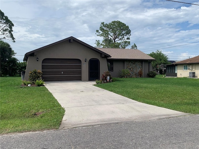 18094 Ackerman Ave, Port Charlotte, FL 33948 - ranch-style home with stucco siding, a garage, a front lawn, and driveway