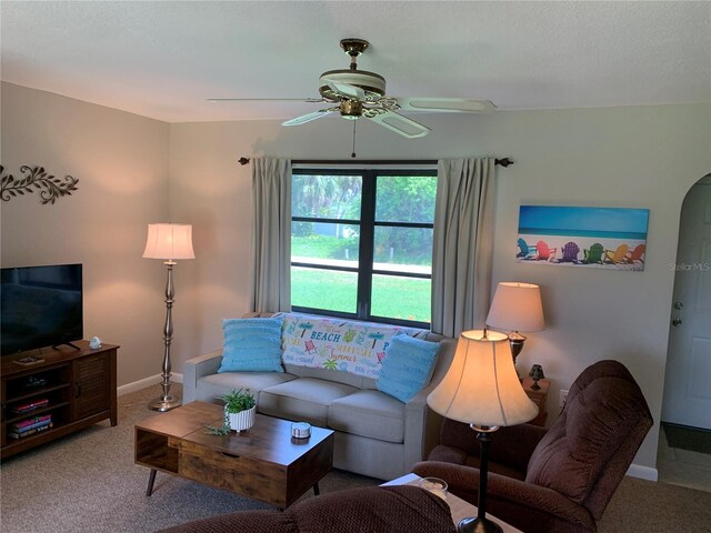 18094 Ackerman Ave, Port Charlotte, FL 33948 - living room featuring ceiling fan and carpet flooring