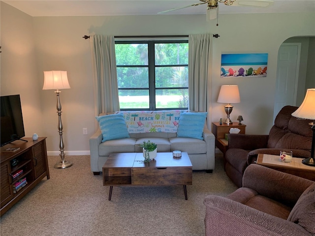 18094 Ackerman Ave, Port Charlotte, FL 33948 - carpeted living room featuring arched walkways and ceiling fan