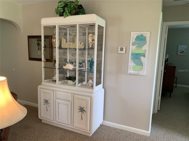 18094 Ackerman Ave, Port Charlotte, FL 33948 - detailed view of carpet flooring and arched walkways