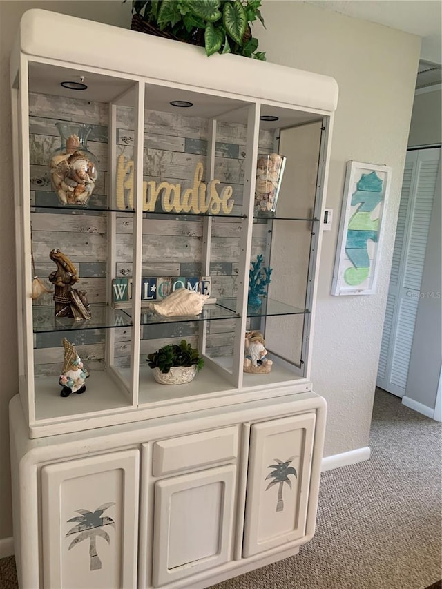 18094 Ackerman Ave, Port Charlotte, FL 33948 - detailed view of carpet flooring and baseboards