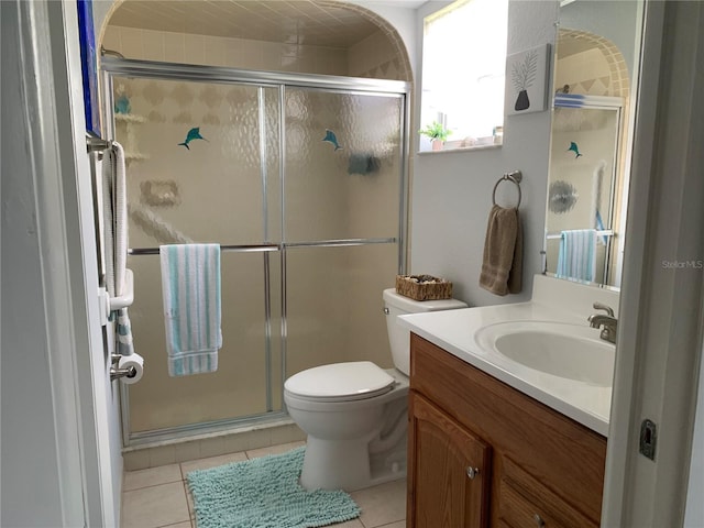 18094 Ackerman Ave, Port Charlotte, FL 33948 - full bathroom featuring vanity, a stall shower, and tile patterned floors