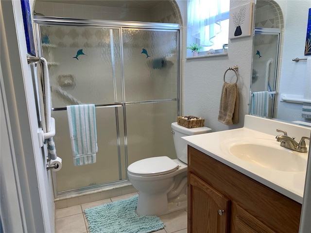 18094 Ackerman Ave, Port Charlotte, FL 33948 - full bathroom with vanity, a shower stall, and tile patterned floors