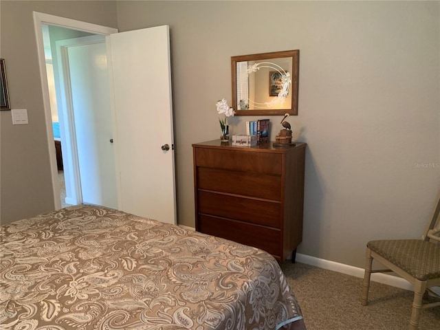 18094 Ackerman Ave, Port Charlotte, FL 33948 - carpeted bedroom featuring baseboards