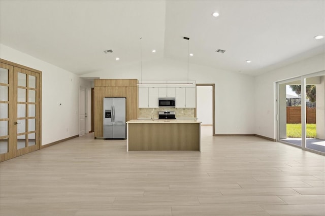 4530 Boston Ter, North Port, FL 34288 - kitchen with stainless steel fridge, range, light countertops, open floor plan, and tasteful backsplash