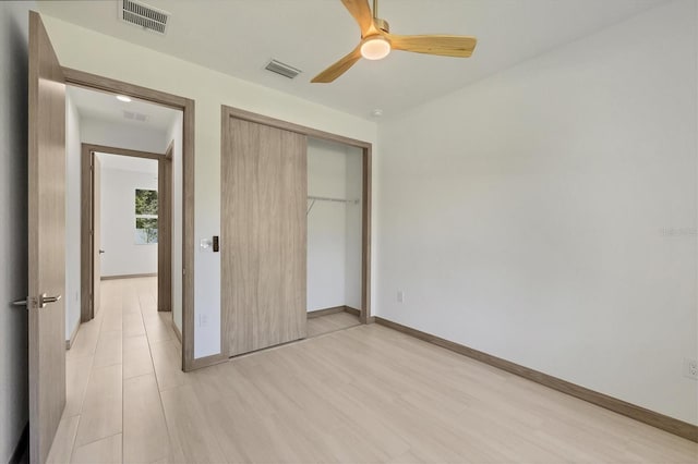 4530 Boston Ter, North Port, FL 34288 - unfurnished bedroom with a closet and a ceiling fan