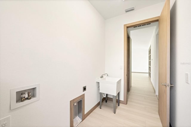 4530 Boston Ter, North Port, FL 34288 - washroom with hookup for an electric dryer and washer hookup
