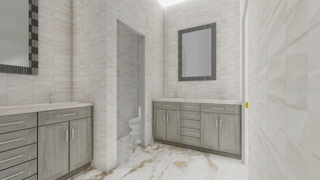 24317 Treasure Island Blvd, Punta Gorda, FL 33955 - full bath featuring tile walls, double vanity, and marble tiled floors