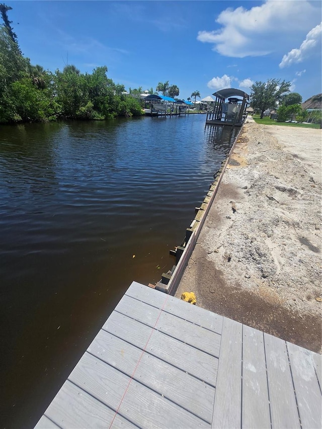24317 Treasure Island Blvd, Punta Gorda, FL 33955 - dock area featuring a water view