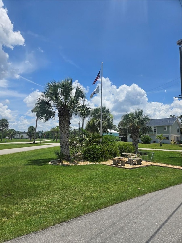 24317 Treasure Island Blvd, Punta Gorda, FL 33955 - surrounding community featuring a yard
