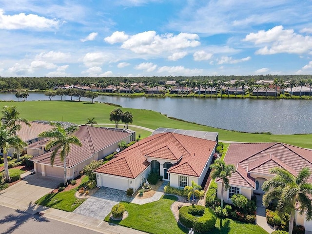 3385 Via Montana Way N, Fort Myers, FL 33917 - aerial view of residential area with a large body of water and a golf course