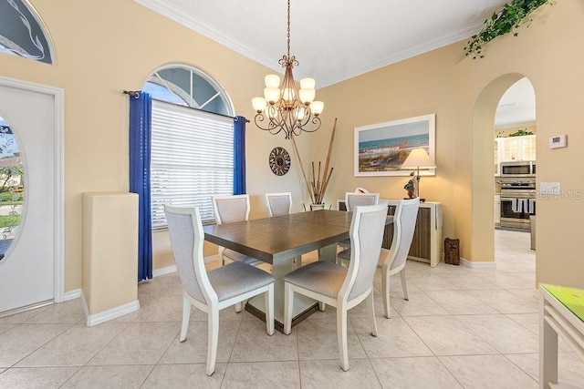 3385 Via Montana Way N, Fort Myers, FL 33917 - dining area with a chandelier, ornamental molding, light tile patterned flooring, and arched walkways
