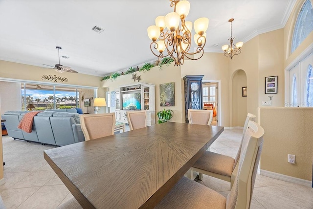 3385 Via Montana Way N, Fort Myers, FL 33917 - dining space with light tile patterned flooring, arched walkways, plenty of natural light, and crown molding