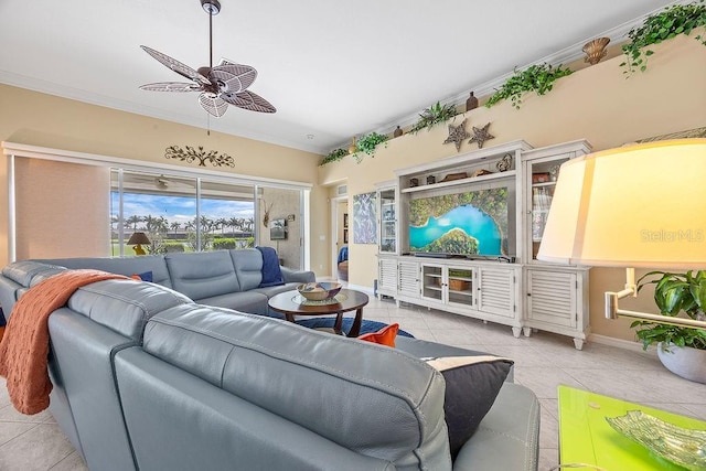 3385 Via Montana Way N, Fort Myers, FL 33917 - living room with tile patterned flooring, ceiling fan, and ornamental molding