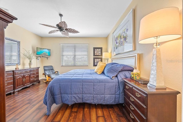 3385 Via Montana Way N, Fort Myers, FL 33917 - bedroom with dark wood-style flooring and ceiling fan