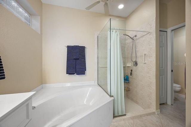 3385 Via Montana Way N, Fort Myers, FL 33917 - bathroom featuring a bath, a stall shower, a ceiling fan, tile patterned floors, and vanity