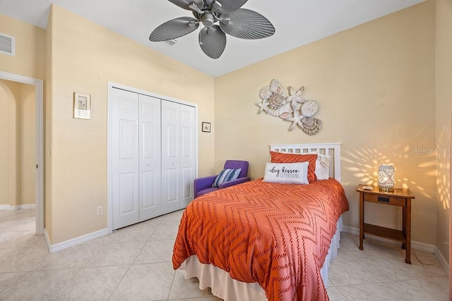 3385 Via Montana Way N, Fort Myers, FL 33917 - bedroom featuring light tile patterned floors, a closet, and a ceiling fan