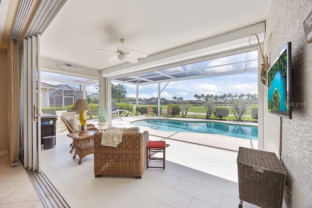3385 Via Montana Way N, Fort Myers, FL 33917 - outdoor pool with a ceiling fan, a patio, and a lanai