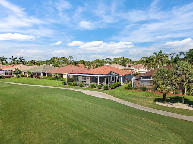 3385 Via Montana Way N, Fort Myers, FL 33917 - view of community featuring a yard, a residential view, and view of golf course