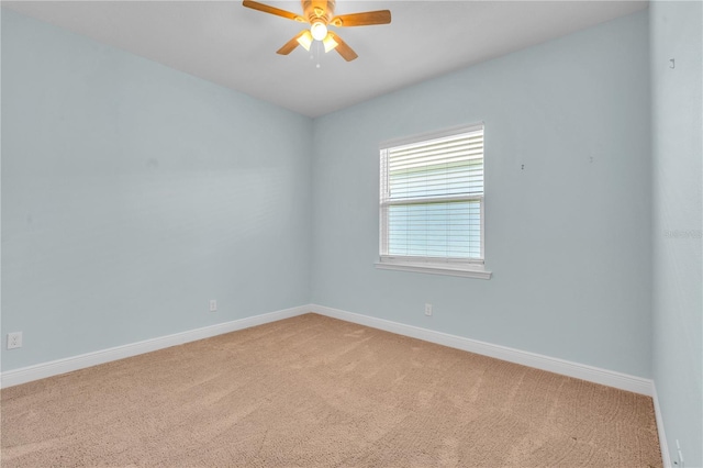 10478 Coquina Ct, Placida, FL 33946 - carpeted spare room with ceiling fan and baseboards