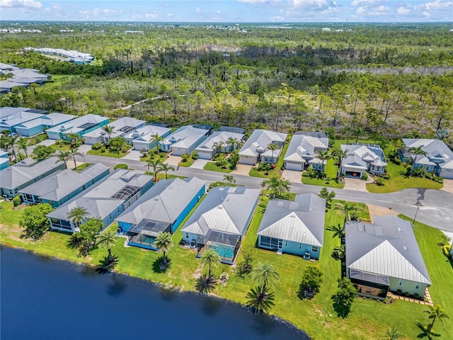 10478 Coquina Ct, Placida, FL 33946 - aerial view of residential area with a large body of water and a forest