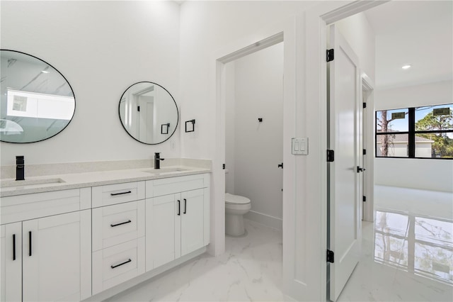 2911 37th St W, Lehigh Acres, FL 33971 - full bath featuring marble finish floors, double vanity, and recessed lighting