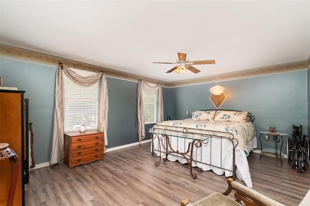 6605 NE Masters Ave, Arcadia, FL 34266 - bedroom featuring wood finished floors, ornamental molding, and ceiling fan