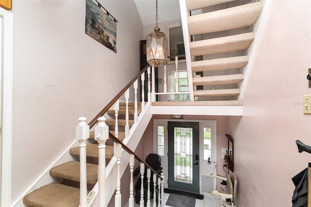 6605 NE Masters Ave, Arcadia, FL 34266 - entrance foyer featuring stairway and a towering ceiling