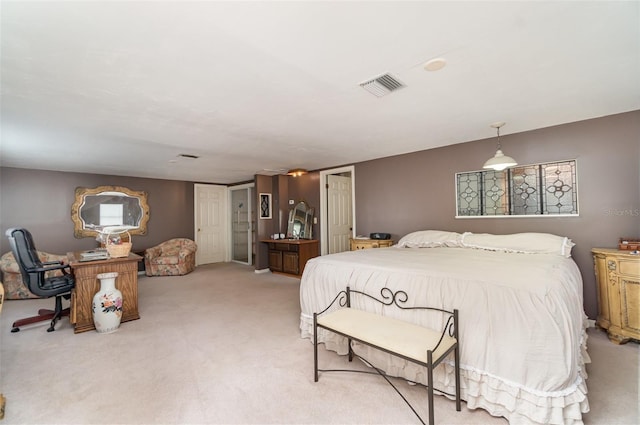 6605 NE Masters Ave, Arcadia, FL 34266 - bedroom featuring light carpet and multiple closets