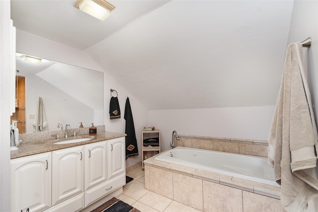 6605 NE Masters Ave, Arcadia, FL 34266 - bathroom featuring vaulted ceiling, a bath, vanity, and tile patterned flooring
