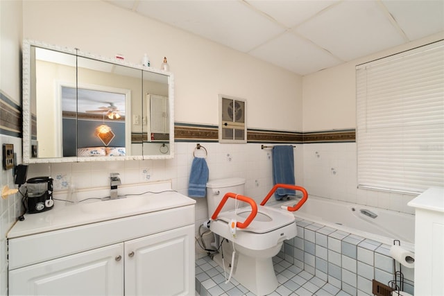 6605 NE Masters Ave, Arcadia, FL 34266 - bathroom featuring vanity, a garden tub, tile patterned floors, and tile walls