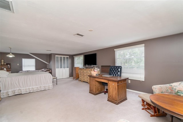 6605 NE Masters Ave, Arcadia, FL 34266 - bedroom featuring light carpet and a desk