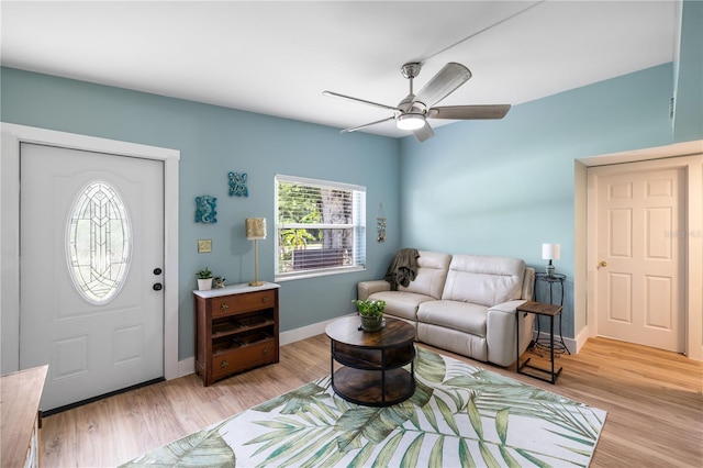 1027 Coral Ridge Dr, Punta Gorda, FL 33950 - living area with ceiling fan and light wood finished floors