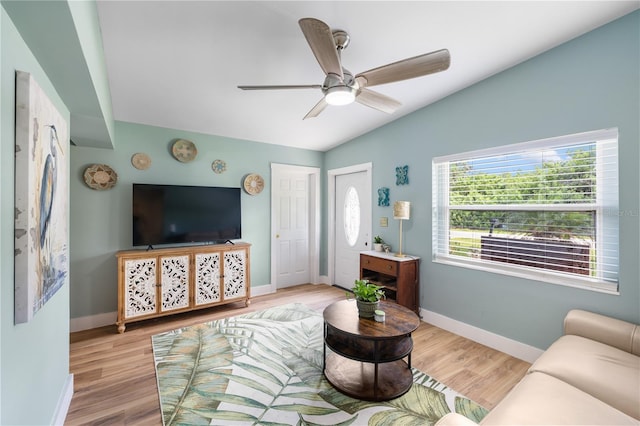 1027 Coral Ridge Dr, Punta Gorda, FL 33950 - living room with ceiling fan, light wood-style floors, and lofted ceiling