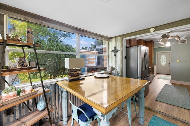 1027 Coral Ridge Dr, Punta Gorda, FL 33950 - dining room with light wood finished floors and a ceiling fan