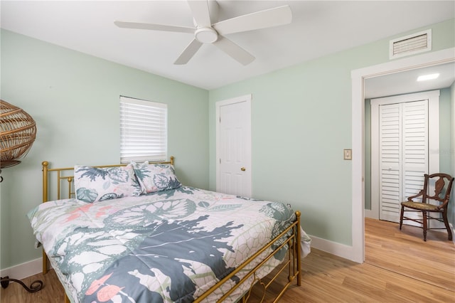 1027 Coral Ridge Dr, Punta Gorda, FL 33950 - bedroom featuring light wood-style flooring and a ceiling fan