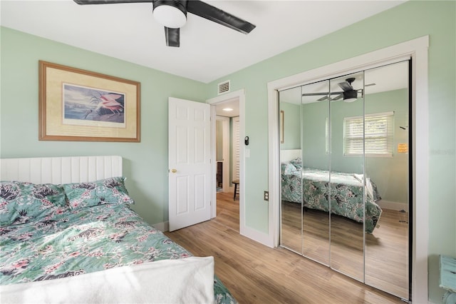1027 Coral Ridge Dr, Punta Gorda, FL 33950 - bedroom featuring wood finished floors, ceiling fan, and a closet