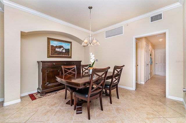17454 Old Harmony Dr Unit 101, Fort Myers, FL 33908 - dining room with crown molding, a chandelier, and light tile patterned flooring