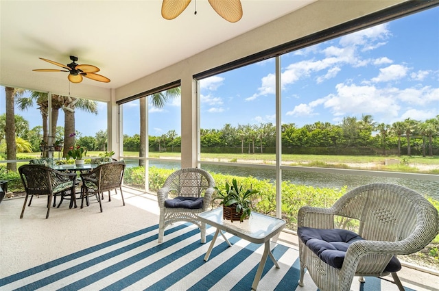 17454 Old Harmony Dr Unit 101, Fort Myers, FL 33908 - sunroom with ceiling fan, view of wooded area, and a water view