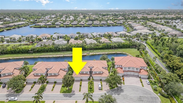 17454 Old Harmony Dr Unit 101, Fort Myers, FL 33908 - aerial perspective of suburban area featuring a large body of water