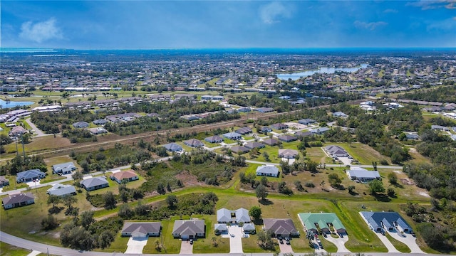 1115 San Cristobal Ave, Punta Gorda, FL 33983 - aerial view of property's location featuring a large body of water and nearby suburban area