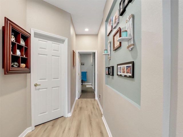 4180 Lenox Blvd, Venice, FL 34293 - corridor featuring light wood-type flooring