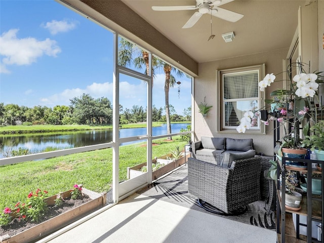 4180 Lenox Blvd, Venice, FL 34293 - sunroom / solarium with ceiling fan, a water view, an outdoor living space, and view of wooded area