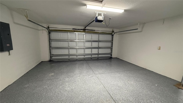 7052 Legion St, Port Charlotte, FL 33981 - garage with electric panel and a garage door opener