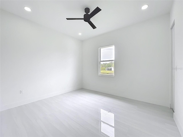 576 Mcdill Dr, Port Charlotte, FL 33953 - empty room featuring recessed lighting, a ceiling fan, and light wood-style floors