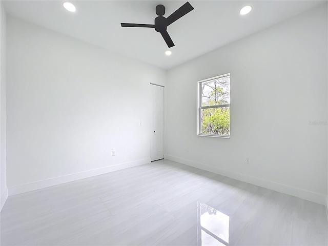 576 Mcdill Dr, Port Charlotte, FL 33953 - unfurnished room featuring ceiling fan, recessed lighting, and light wood-style flooring