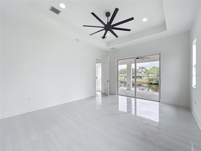 576 Mcdill Dr, Port Charlotte, FL 33953 - empty room with ceiling fan, recessed lighting, and a water view